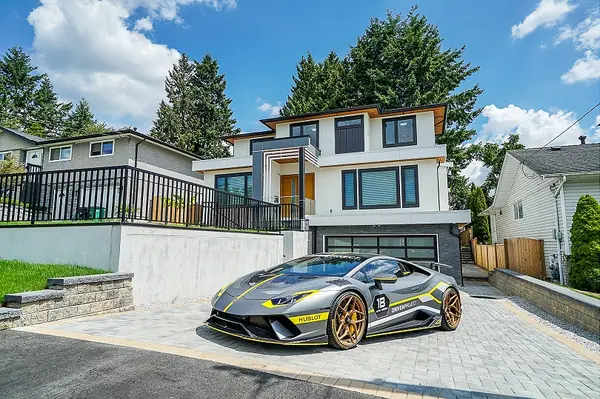 Completed home seen from the street with the driveway court