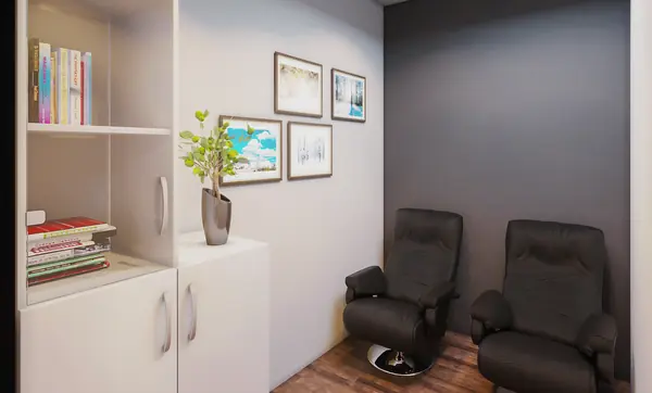 Treatment room with two recliners and built-in storage